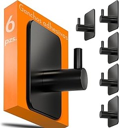 Soluciones creativas para colgar toallas en baños reducidos